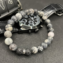 Charger l'image dans la galerie, dans le cadre du mois d'ocotbre dédié à la prévention contre le cancer du sein, la sicilienne vous propose un bracelet spécialement pour les hommes qui montrenet leur soutien à toutes les femmes. Le bracelet en perles noires revêt une perle rose discrète. Bracelets en pierres naturelles fabriqué en France