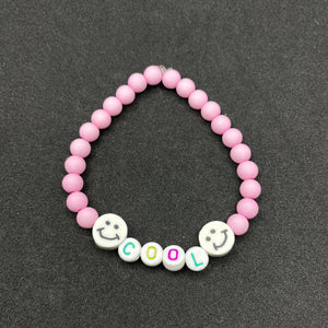 bracelet cool pour enfant rose et smiley blanc