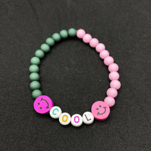 bracelet bicolor cool pour fille rose et vert avec des smiley